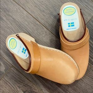 Nude slip on leather clogs